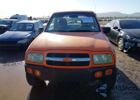 2000 Chevrolet Tracker из США, поврежденный, VIN 2CNBJ1863Y6920157